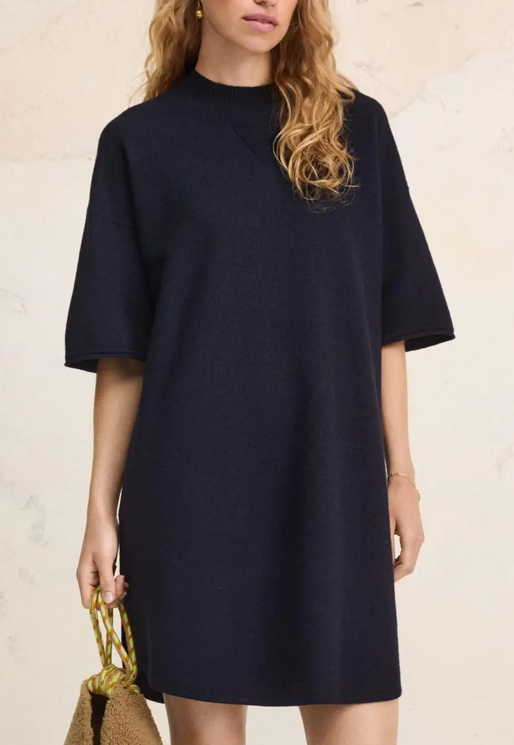 Short knitted dress
Boiled wool