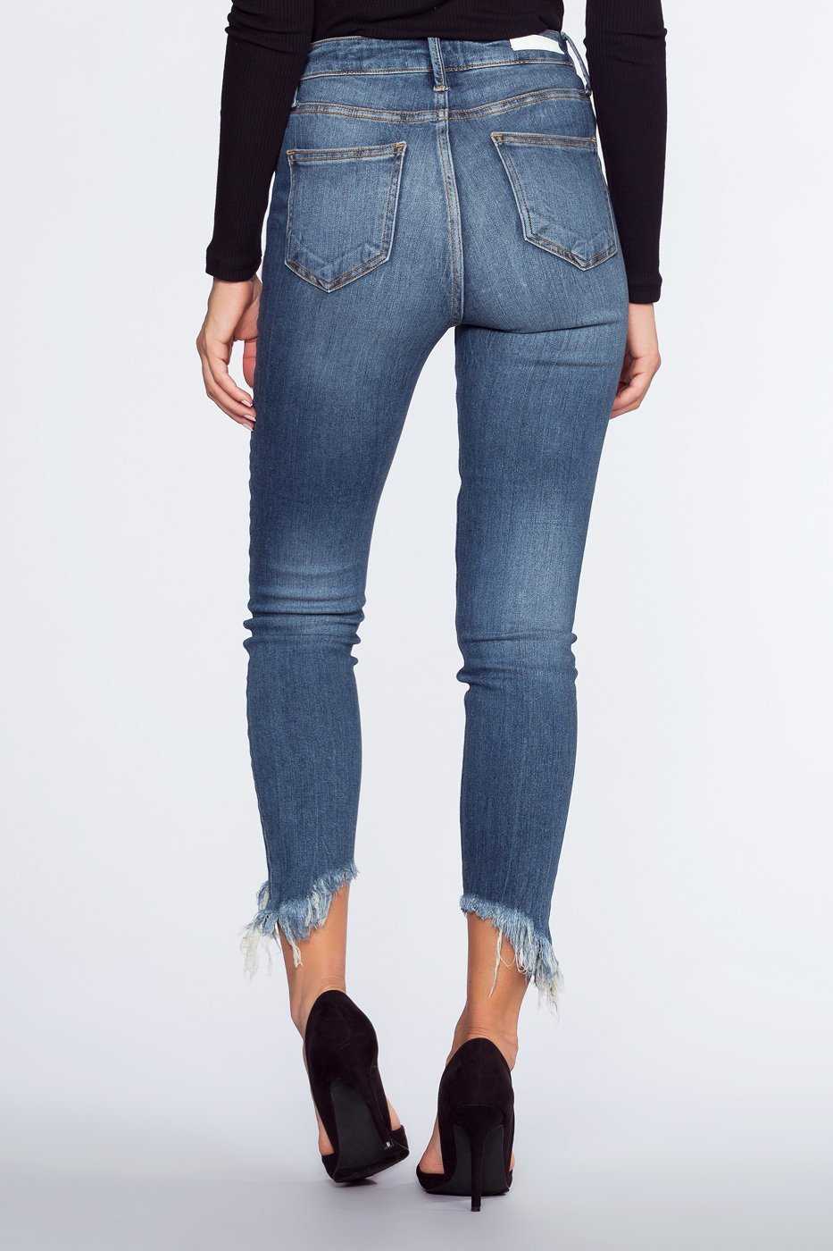 Washed and frayed skinny jeans