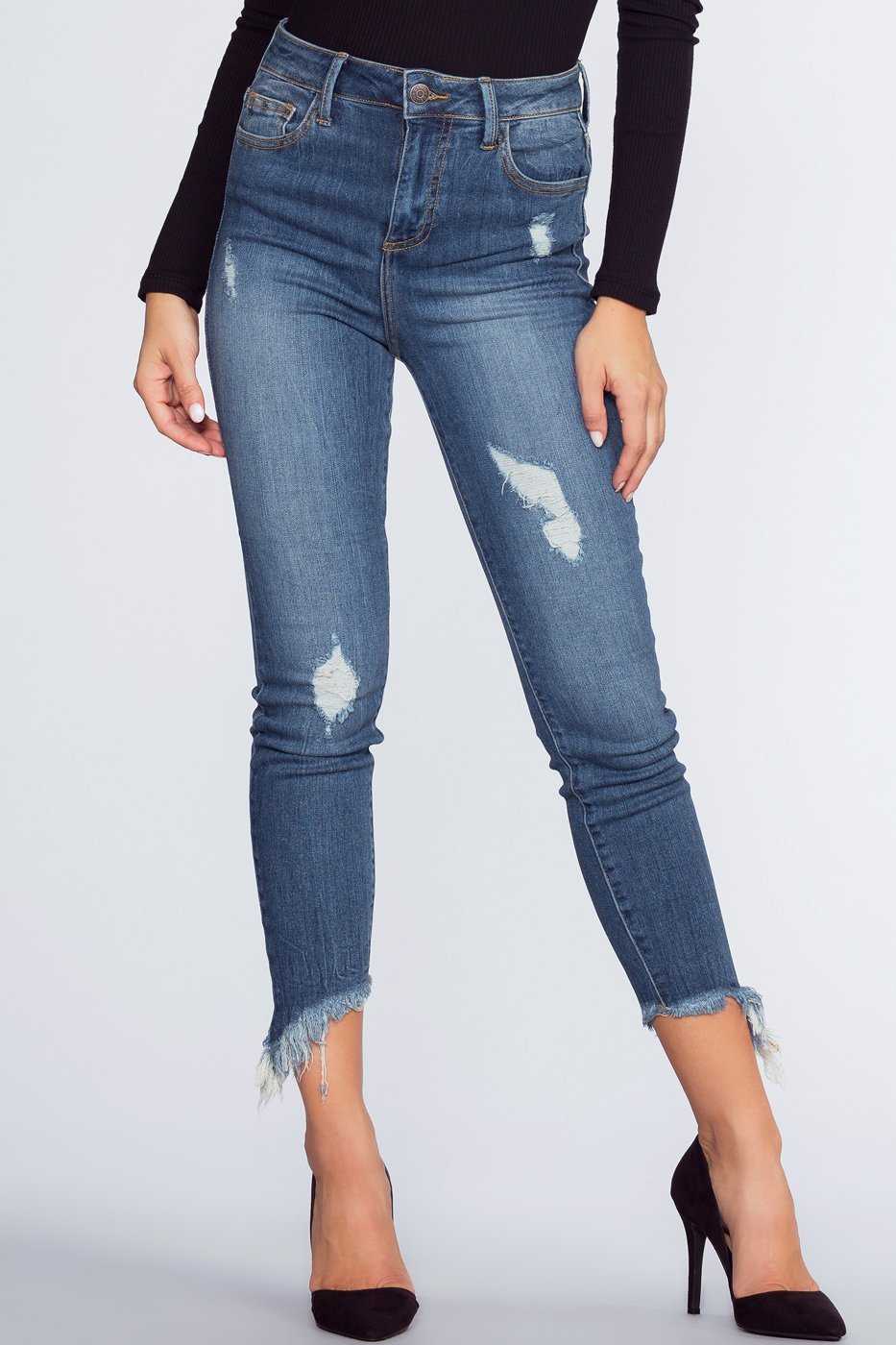 Washed and frayed skinny jeans