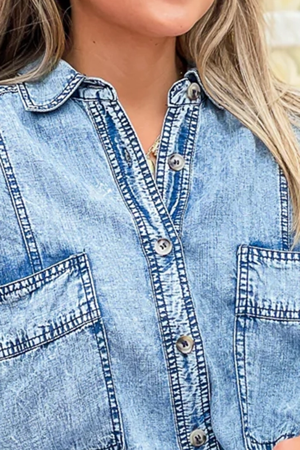 Distressed denim long sleeve top