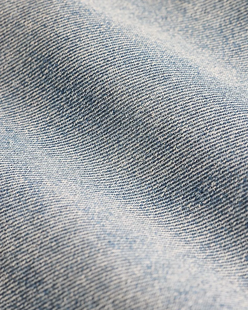 Mid Rise Light Wash Ripped Back Slit Skyscraper Jeans