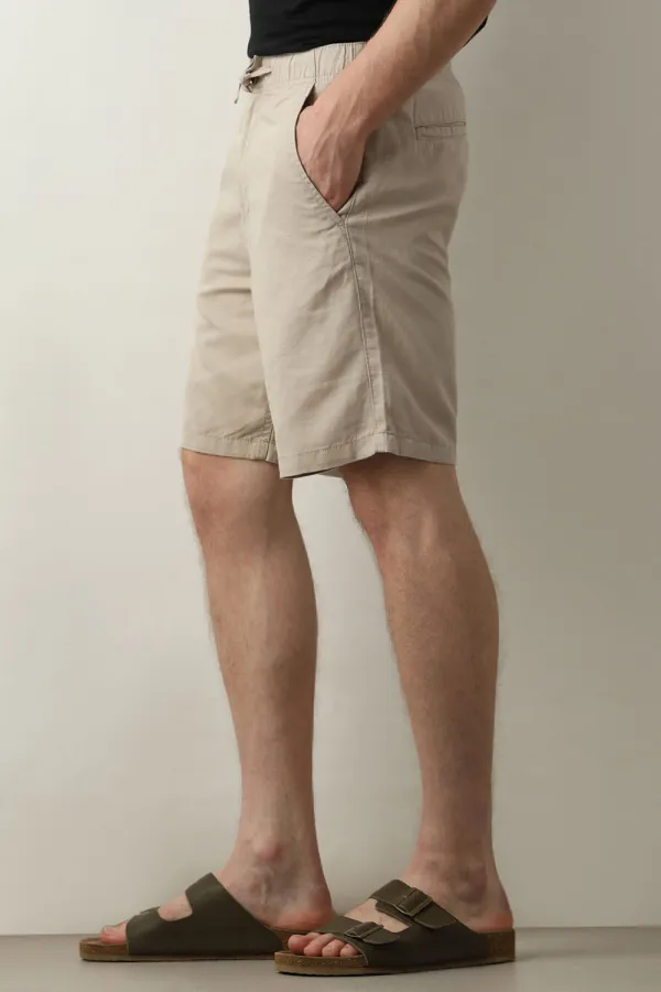 Beige Mid Rise Drawstring Linen Shorts