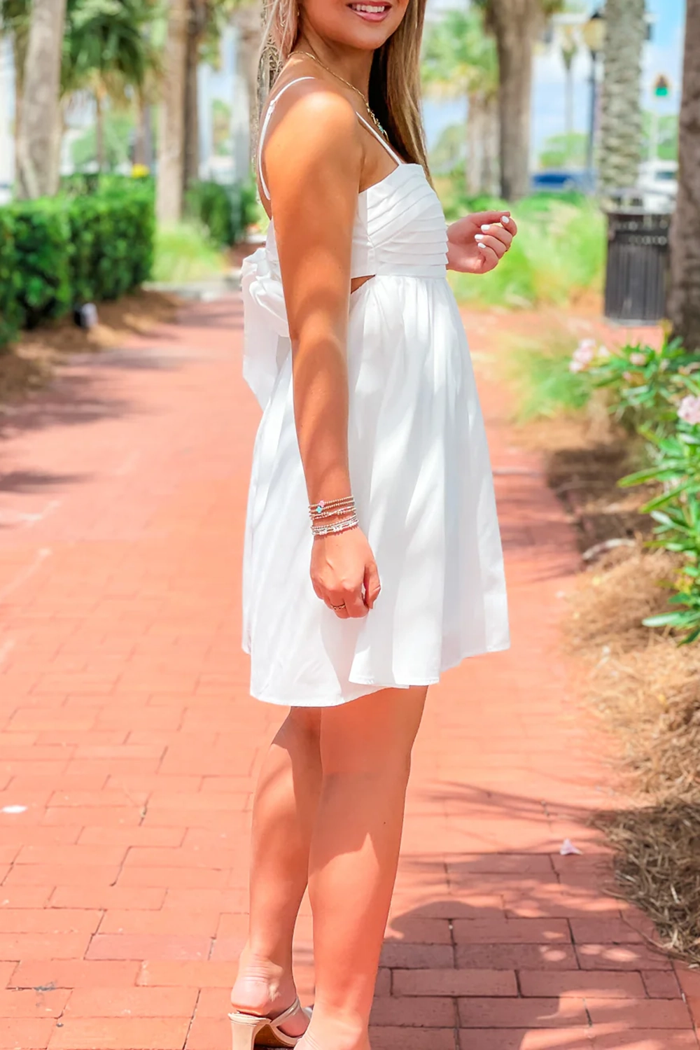 Short dress with bow tie at back