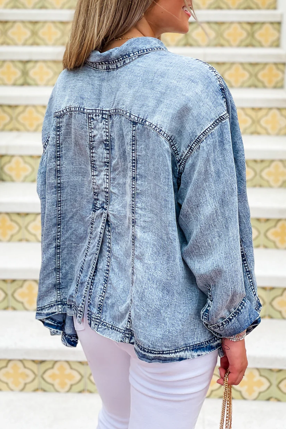 Distressed denim long sleeve top