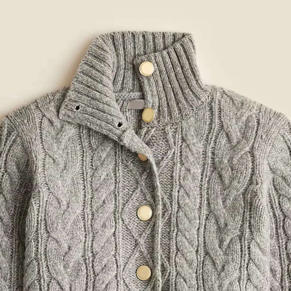 Cable-knit turtleneck cardigan sweater