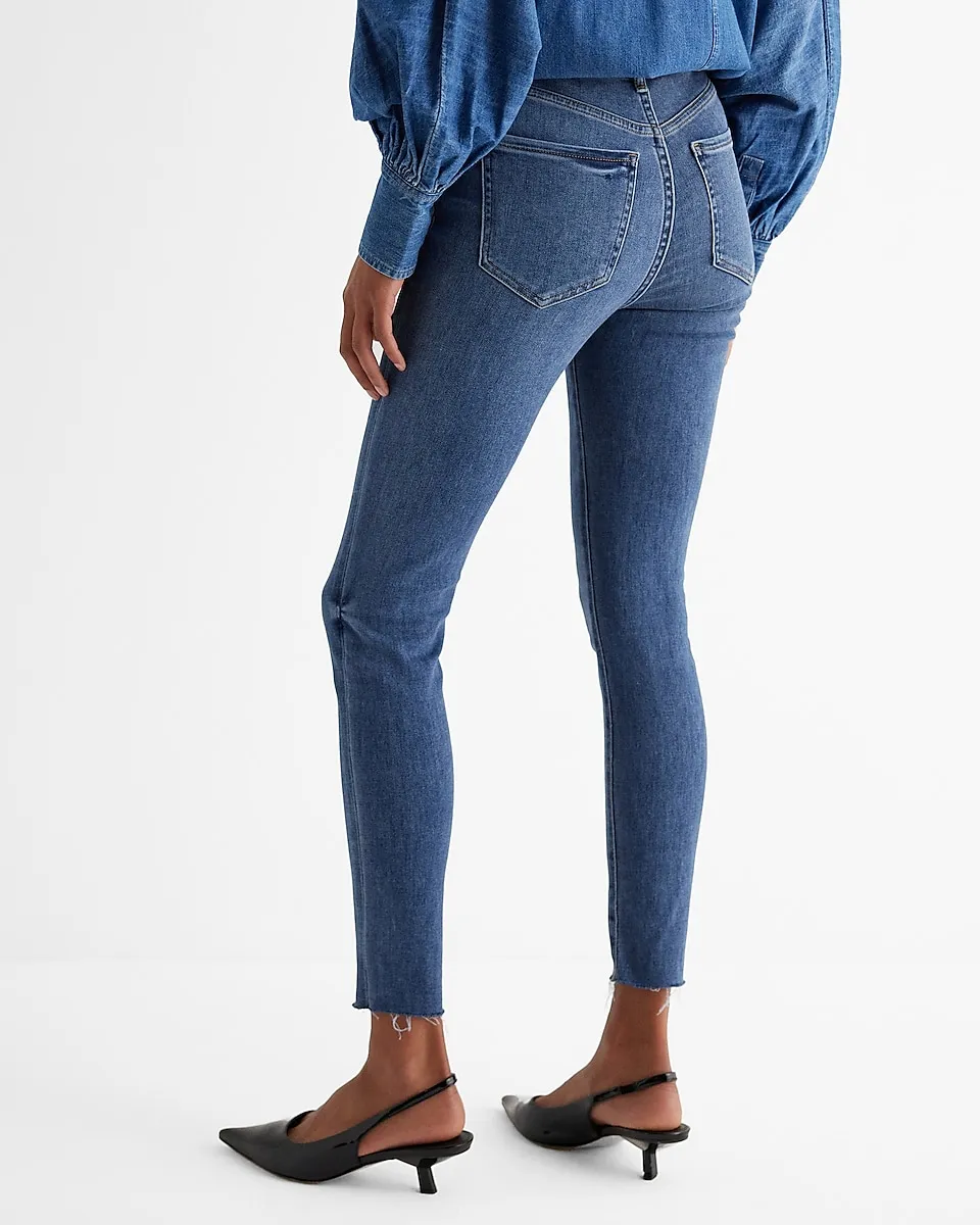 High Waisted Medium Wash Raw Hem Skinny Jeans